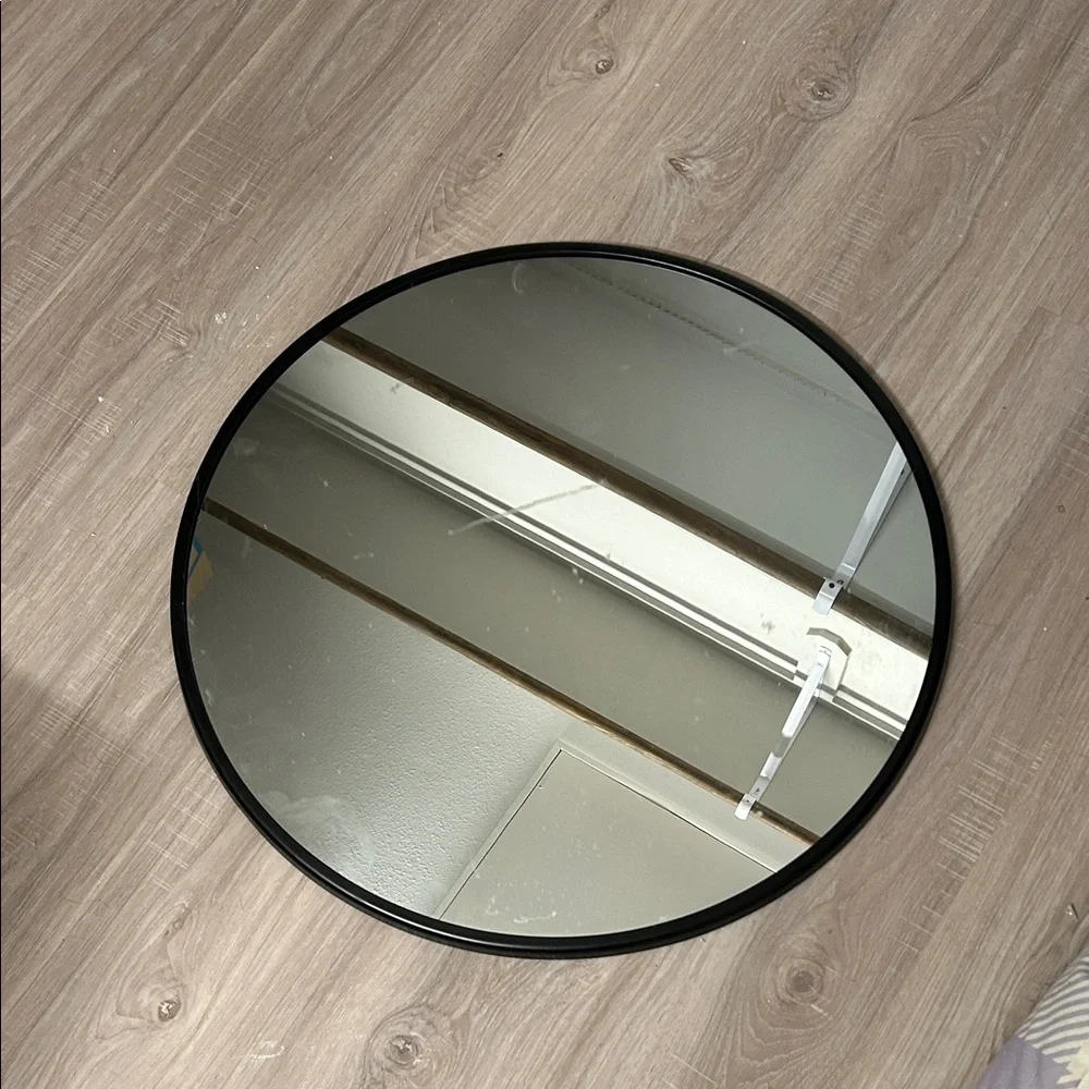 Sleek Black Round Wall Mirror
